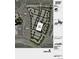 Overhead view of lot with buildings, landscaping, and an arrow pointing to the property at 8953 Southurst St, Littleton, CO 80129