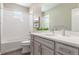 Bright bathroom with a shower-tub combination, modern vanity and neutral tones at 8953 Southurst St, Littleton, CO 80129