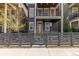 Two-story home with a covered porch and balcony, offering a blend of indoor and outdoor living at 8953 Southurst St, Littleton, CO 80129