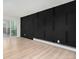 Empty bedroom featuring a unique black accent wall at 3470 S Poplar St # 401, Denver, CO 80224