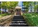 The building's entrance is highlighted by a set of outdoor stairs, offering a grand and welcoming entry point at 3470 S Poplar St # 401, Denver, CO 80224