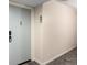 Hallway view leading to unit 401, ensuring privacy and security in a well-maintained building at 3470 S Poplar St # 401, Denver, CO 80224