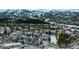 Breathtaking aerial view of ski slopes and lodging with trees and snow at 62 Broken Lance Dr # 202E, Breckenridge, CO 80424