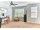Bright office features a ceiling fan, large windows, and comfortable seating, creating an inviting workspace at 6365 Orion Ct # B, Arvada, CO 80403