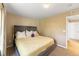 Comfortable bedroom features a plush bed and ample natural light at 1459 S Pierce St, Lakewood, CO 80232