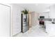 Stylish kitchen with stainless steel appliances, ample cabinet space, and marble floors at 1459 S Pierce St, Lakewood, CO 80232