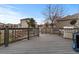 Outdoor deck with barbecue and basketball court at 5404 Fawn Ridge Way, Castle Rock, CO 80104