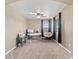 Bright bedroom featuring neutral walls, carpet, ceiling fan, and window with natural light at 5404 Fawn Ridge Way, Castle Rock, CO 80104