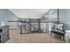 Carpeted loft area with iron railing, offering an additional space for relaxation or recreation at 5404 Fawn Ridge Way, Castle Rock, CO 80104