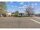 Cozy single-story home with a well-maintained yard on a corner lot with mature trees at 4401 W Mississippi Ave, Denver, CO 80219