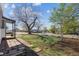 Home front yard featuring brick and grass with street view at 4401 W Mississippi Ave, Denver, CO 80219