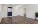 Inviting living room features stylish wood floors, neutral walls, and abundant natural light at 4401 W Mississippi Ave, Denver, CO 80219