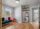 Bright bedroom with hardwood floors, complemented by natural light from the window at 1670 Oakland St, Aurora, CO 80010
