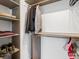 Closet with shelves, hanging rods and storage, offering ample space for organizing clothes and personal items at 1670 Oakland St, Aurora, CO 80010
