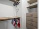 Organized closet with shelves, rods, and drawers providing plenty of storage space for clothes and accessories at 1670 Oakland St, Aurora, CO 80010