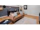 Well-lit living room featuring hardwood floors, stylish furniture, and decorative elements creating a warm and inviting atmosphere at 1670 Oakland St, Aurora, CO 80010