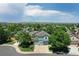 Lovely home with a three-car garage surrounded by lush greenery and neighborhood trees at 12535 S Beaver Creek Way, Parker, CO 80134