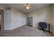 Bedroom with closet, carpet flooring, ceiling fan and desk at 12535 S Beaver Creek Way, Parker, CO 80134