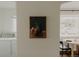 Open-concept space with modern art and dining area, blending classic decor with contemporary living at 4422 W 27Th Ave, Denver, CO 80212