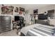 Well-lit bedroom featuring modern decor, computer setup, and a comfortable bed at 5964 E 141St Ave, Thornton, CO 80602