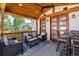 Relaxing covered patio with comfortable seating and a charming wooden ceiling, great for outdoor lounging at 1911 S Lafayette St, Denver, CO 80210