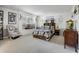 Comfortable bedroom with a window seat and creative decor at 6005 S Jamaica Way, Englewood, CO 80111