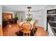 Bright dining area featuring a table, chairs, and natural light from windows at 6005 S Jamaica Way, Englewood, CO 80111