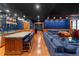 Finished basement with a bar, comfortable seating, and custom millwork at 425 Monroe St, Denver, CO 80206