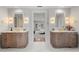 Bright bathroom featuring double vanities with marble countertops at 425 Monroe St, Denver, CO 80206