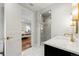 Stylish bathroom featuring a glass shower, elegant vanity, and marble tile at 425 Monroe St, Denver, CO 80206