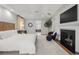 Light-filled bedroom featuring a fireplace, TV, and comfortable seating at 425 Monroe St, Denver, CO 80206