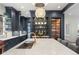 Modern kitchen with a large marble island, stylish lighting, and professional-grade appliances at 425 Monroe St, Denver, CO 80206
