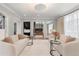 Inviting living room with neutral tones, plush sofas, and ample natural light at 425 Monroe St, Denver, CO 80206
