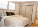 Bright bedroom with a queen-size bed and soft textiles at 2981 S Harrison St, Denver, CO 80210