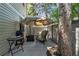 Cozy outdoor seating area with a fire pit, perfect for relaxing near large tree at 7183 S Poplar St, Centennial, CO 80112