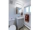 Neat bathroom with modern vanity, a well-lit mirror, and a clean design offering a functional and pleasant space at 383 S 21St Ave, Brighton, CO 80601