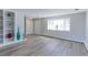 Bright living room features neutral walls, and light-colored hard wood flooring at 383 S 21St Ave, Brighton, CO 80601