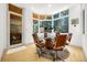 Bright dining room with large windows providing lots of natural light and scenic views at 1250 Dolan Dr, Monument, CO 80132