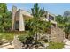 A contemporary home featuring stacked stone accents and a modern design with a manicured garden at 1250 Dolan Dr, Monument, CO 80132