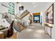Spacious foyer with high ceilings, modern staircase, and ample natural light at 1250 Dolan Dr, Monument, CO 80132