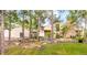 Contemporary home featuring unique design elements, rock landscaping and mature trees at 1250 Dolan Dr, Monument, CO 80132