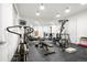 Spacious home gym featuring a variety of workout equipment and mirrored walls at 1250 Dolan Dr, Monument, CO 80132