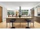 Large kitchen island with seating and modern appliances at 1250 Dolan Dr, Monument, CO 80132