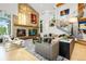 Cozy living room features a modern fireplace, staircase, and stylish furniture at 1250 Dolan Dr, Monument, CO 80132