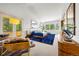 Bright main bedroom features natural light, a seating area, and a private balcony at 1250 Dolan Dr, Monument, CO 80132