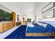 Large main bedroom with a fireplace and wood accents at 1250 Dolan Dr, Monument, CO 80132
