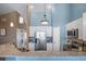 Contemporary kitchen with granite countertops, stainless appliances, and ample cabinet space at 8626 Gold Peak Dr # B, Highlands Ranch, CO 80130