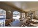 Inviting outdoor patio area with seating and views of the surrounding landscape at 8626 Gold Peak Dr # B, Highlands Ranch, CO 80130