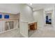 Hallway with built in desk area, carpet, and warm lighting at 12350 Turquoise Terrace St, Castle Pines, CO 80108