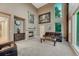 Inviting living room featuring a fireplace, high ceilings, and large windows at 12350 Turquoise Terrace St, Castle Pines, CO 80108